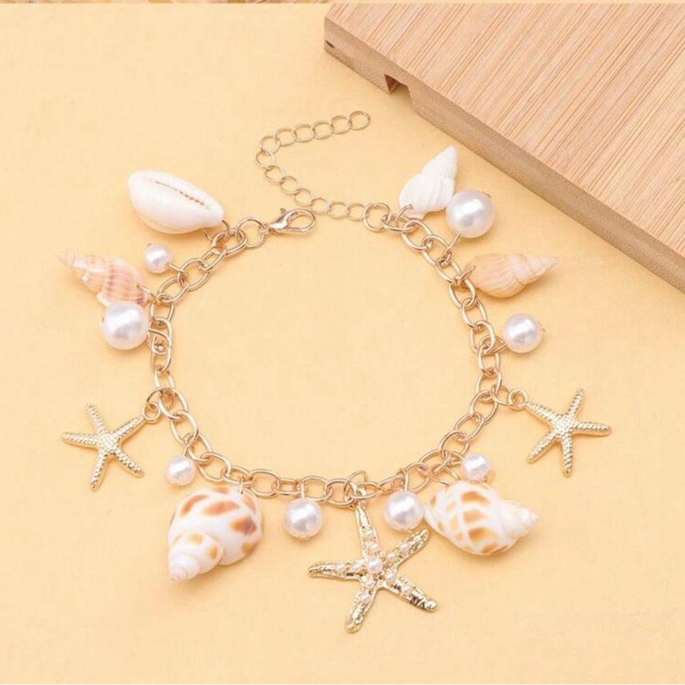 Gold Shell and Starfish Charm Bracelet